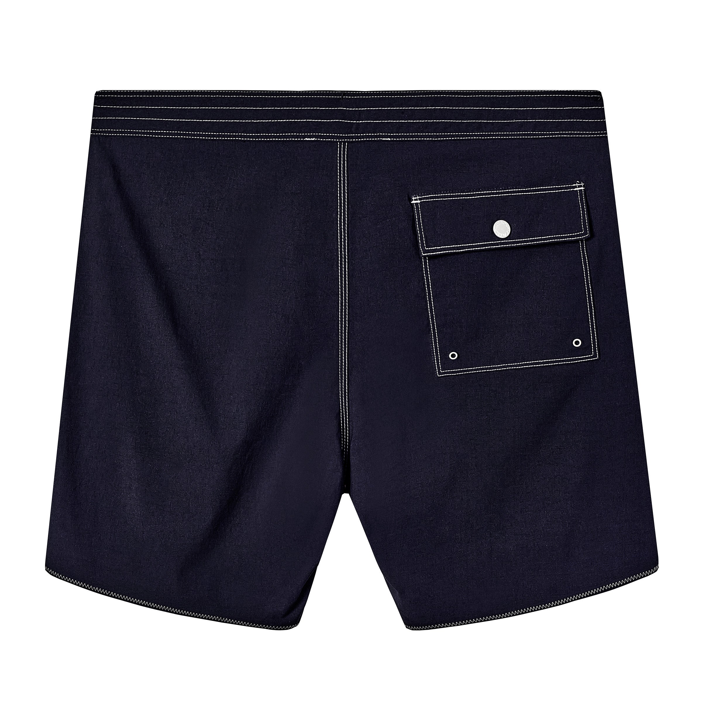 Backside of navy board shorts with white contrast stitching, and one flap pocket on the right side.