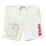 White board shorts with a drawstring waist and beige-trimmed utility pocket on the left leg. Bold red 'Whaler' text is printed vertically on the left leg.