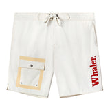 White board shorts with a drawstring waist and beige-trimmed utility pocket on the left leg. Bold red 'Whaler' text is printed vertically on the left leg.