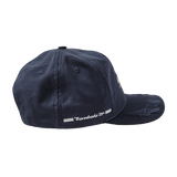 Side view of Boston Whaler Cap, and the right side of hat features  the text “Tombolo '24” flanked by two white stripes.
