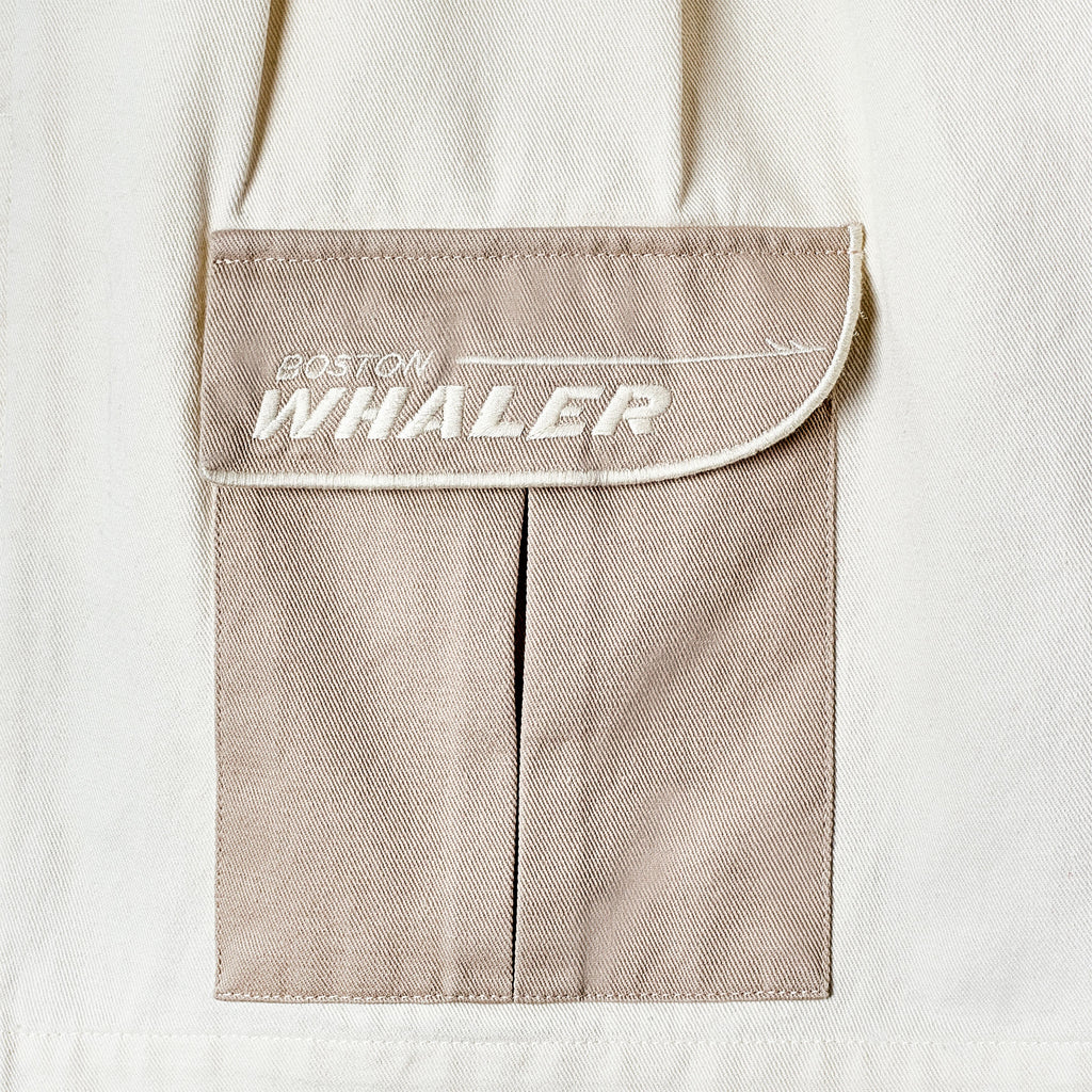 Close-up of flap pocket featuring the 'Boston Whaler' embroidered logo.