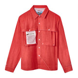 Bright red long-sleeve button-up shirt with white stitching and matching white buttons. Features a large mesh zip pocket layered over a standard chest pocket on the wearer's left side. 