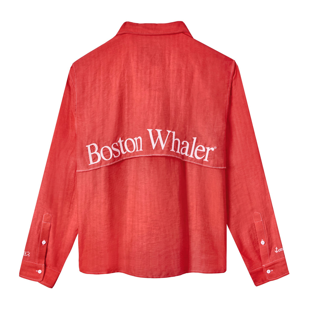 Back view of a long-sleeve red shirt with white embroidery reading 'Boston Whaler' across the vented upper back. White anchor detail stitched above the cuff on the left sleeve.