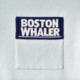 Close-up of color blocked chest pocket with embroidered 'Boston Whaler' logo.