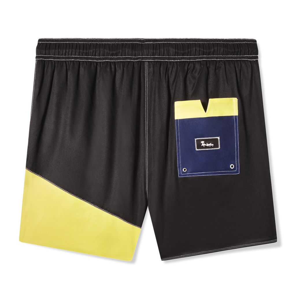 Backwards-facing product image of the 'Boston Whaler' swim trunks that showcase the signature v-slit tombolo back pocket. 