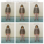 Man wearing quilted jacket in size small to Large to demonstrate sizing