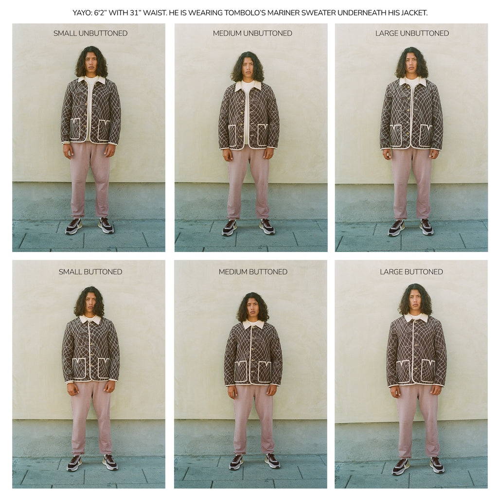 Man wearing quilted jacket in size small to Large to demonstrate sizing