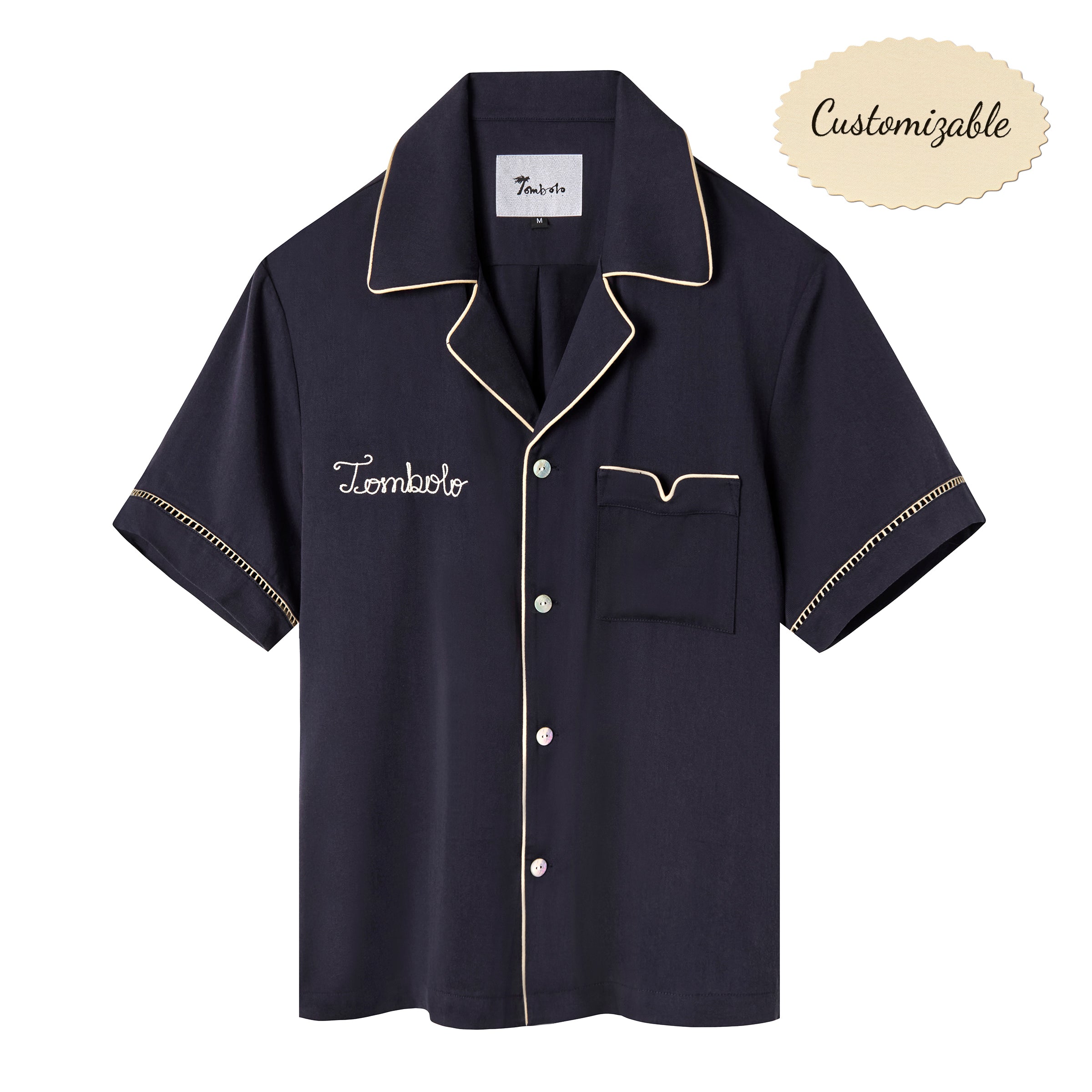 Navy short-sleeved Tencel twill shirt with a relaxed collar, beige piping, and Agoya shell buttons, customizable with embroidery.