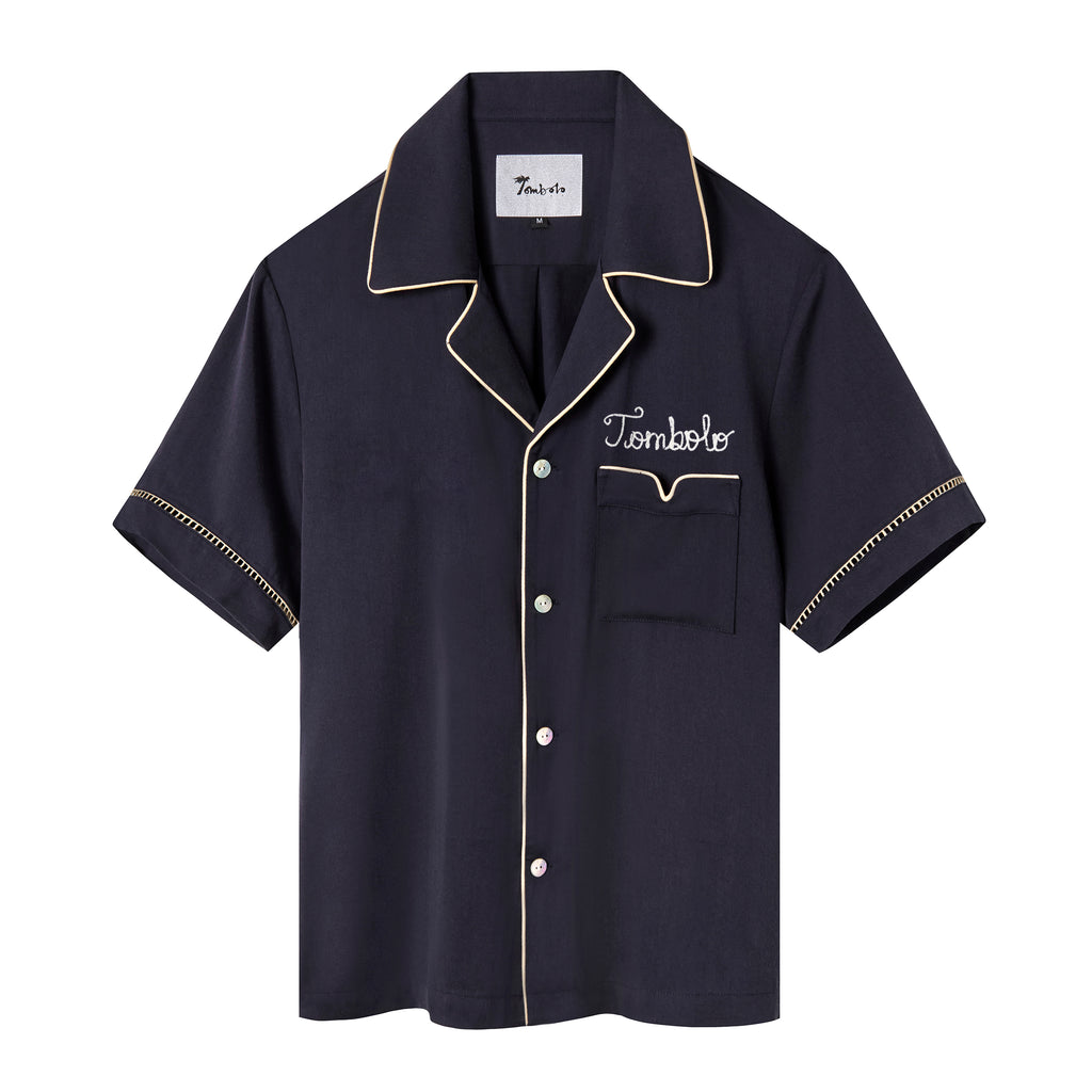 Navy short-sleeved Tencel twill shirt with a relaxed collar, beige piping, and Agoya shell buttons, customizable with embroidery.