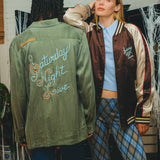 Two models wearing different 'SNL' products, one shown from the front and one from the back.