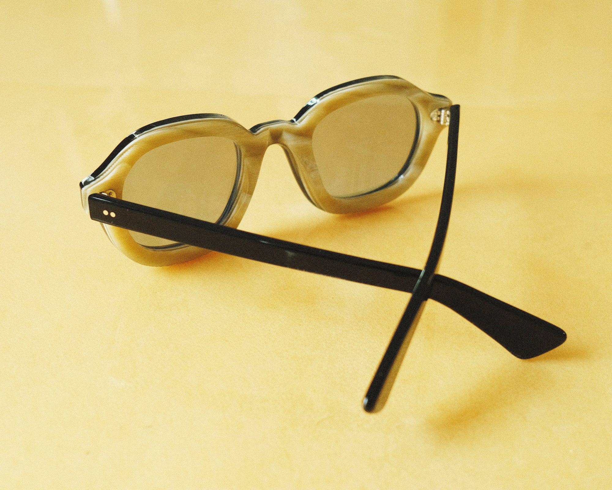 interior close up of thick framed sunglasses