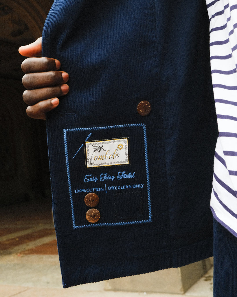 Image of the interior label on the Navy Corduroy Jacket. 