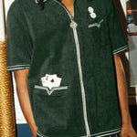 Close up of male model wearing Green Terry Cloth Cabana Shirt, with right hand in pocket. His face is cutout of this image.