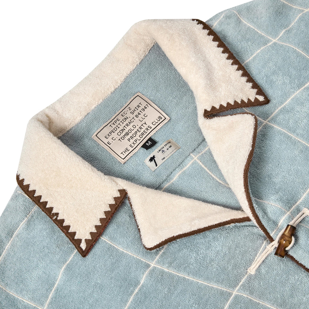 Close up of 'The Explorers Club' Expedition Cabana's interior label. 