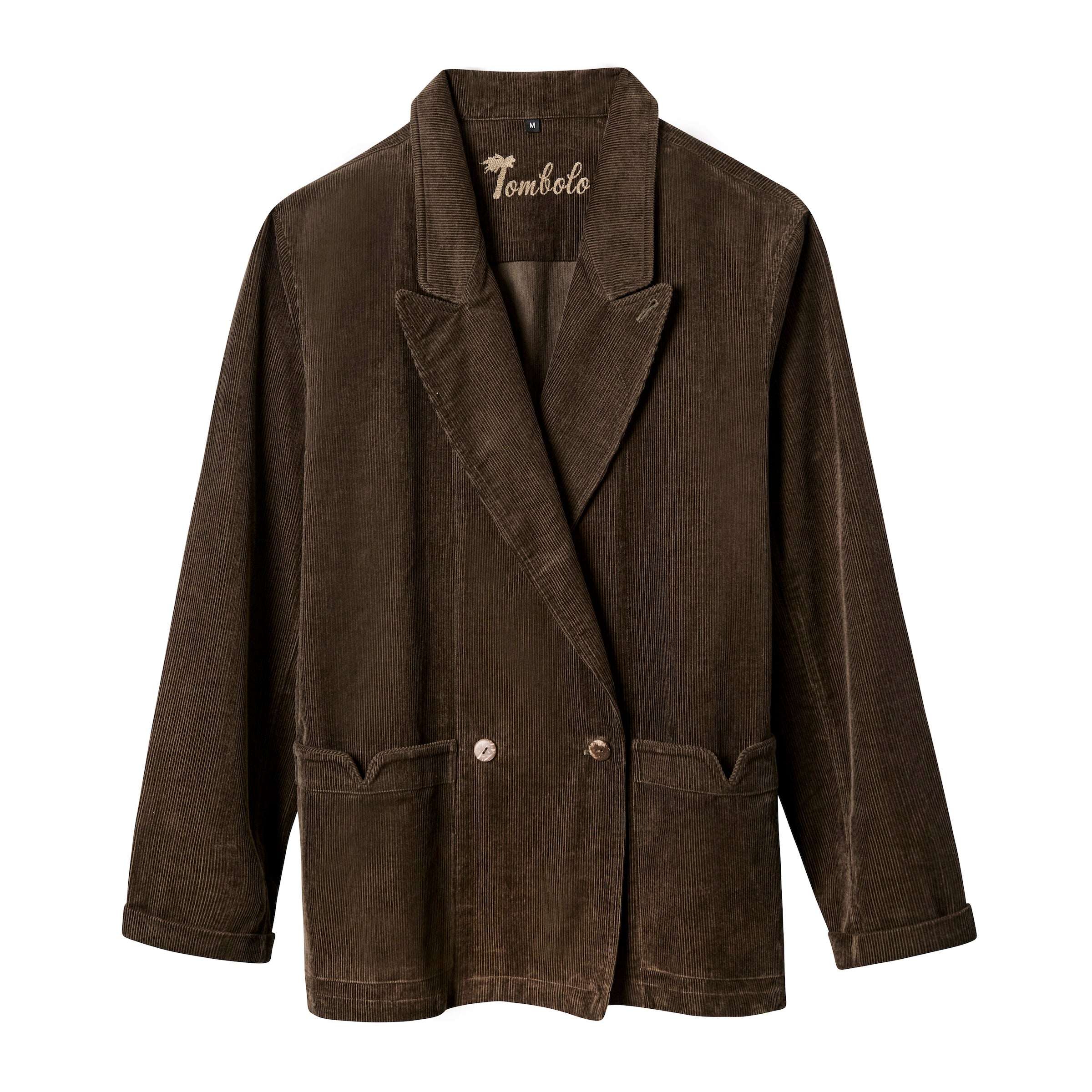 A brown corduroy unstructured suit jacket with peak lapels and a double-breasted closure. It features coconut shell buttons and signature 'V-slit' Tombolo front pockets.