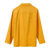 Backside image of the yellow corduroy 'Easy Going Jacket'.