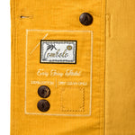 Image of interior care label, featuring the name of the product 'Easy Going Jacket', two spare buttons, and the care instructions. 