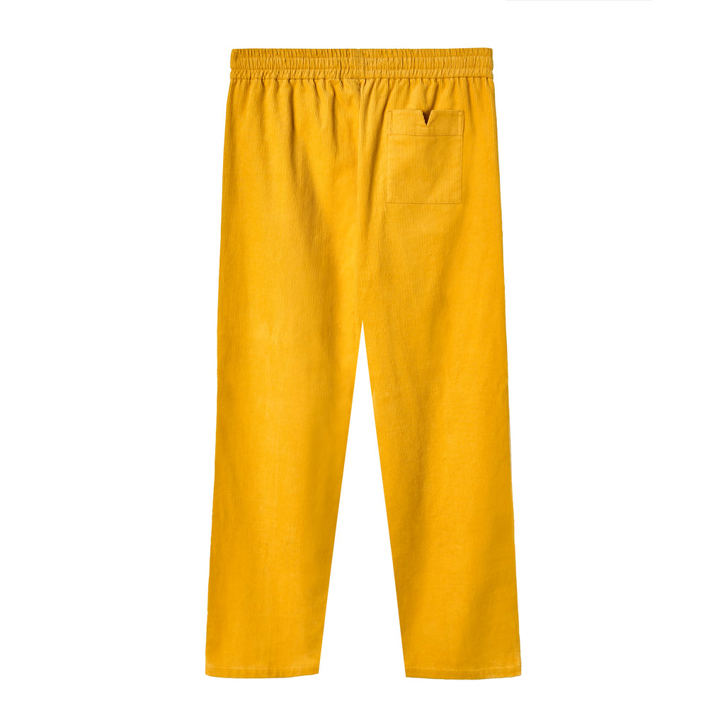 Back view of yellow corduroy pants with an elastic waistband and a single back patch pocket on the right side.