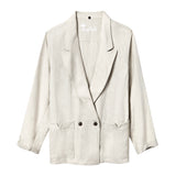 Beige linen suit laid flat facing front