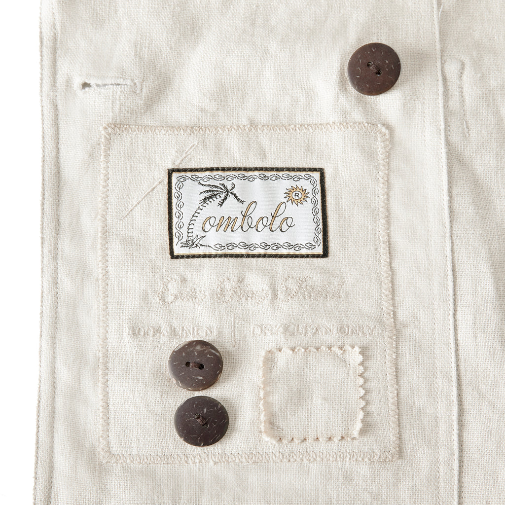 Interior lapel of beige linen suit showing Tombolo label