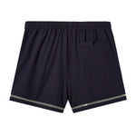 Back side of swim trunks against white background showing the signature V pocket
