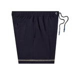 Side shot of swim trunks showing zippered pockets and silicone dipped drawstrings