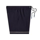 Side shot of swim trunks showing zippered pockets and silicone dipped drawstrings