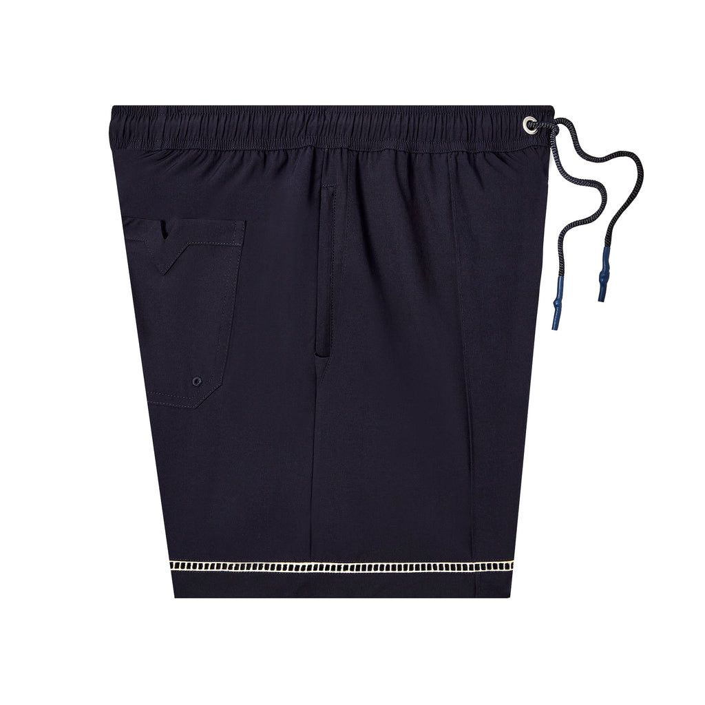 Side shot of swim trunks showing zippered pockets and silicone dipped drawstrings