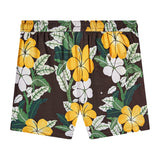 Backwards-facing product image of "Night Bloom" swim trunks with vintage print featuring columns of palms and hibiscus flowers that showcases the Tombolo signature 'V' back pocket