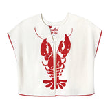 Front-facing product image of the 'Better Half' Hand Towel Top made of 100% Organic Terry Cloth that features a large lobster halved by the chain-stitched front opening, red picot trim frames, a loop button closure at the sternum, Two additional concealed hook-and-eye closures that can be fastened shut to prevent the front panels from fluttering open, and an interior label that is chain-stitched with a hand motif
