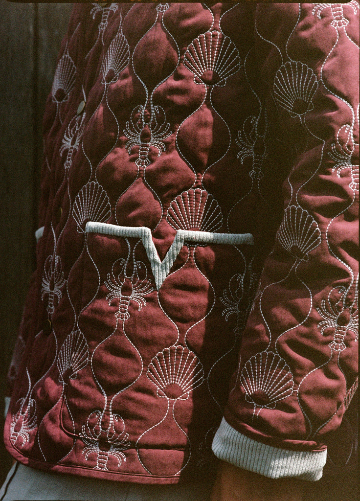 close up of v pocket on jacket