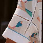 Close up of wesselman motif on stitched shirt