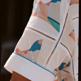 Close up of wesselman motif on stitched shirt