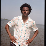 Man puts hands on hips 