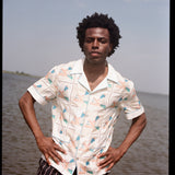 Man puts hands on hips 