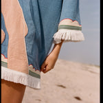 close up of foot motif on poncho