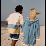 man and woman talk and walk away from the camera