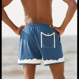 Shot of the backside of a model at the beach wearing the swim trunks