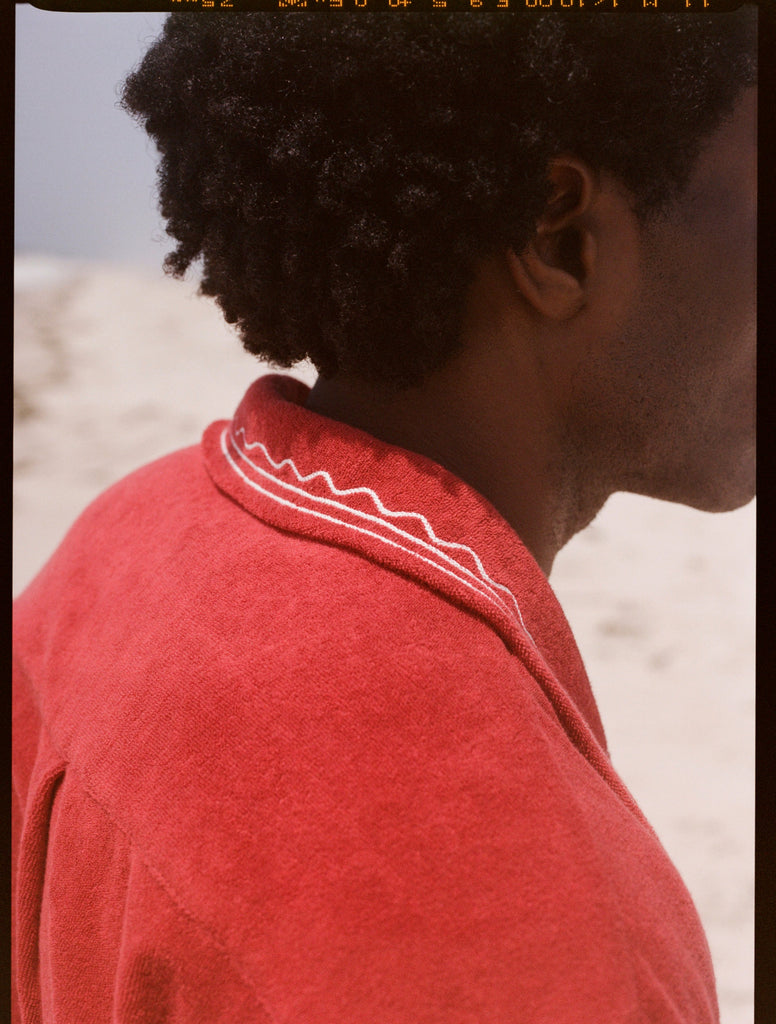 Close up of collar with white embroidered lines