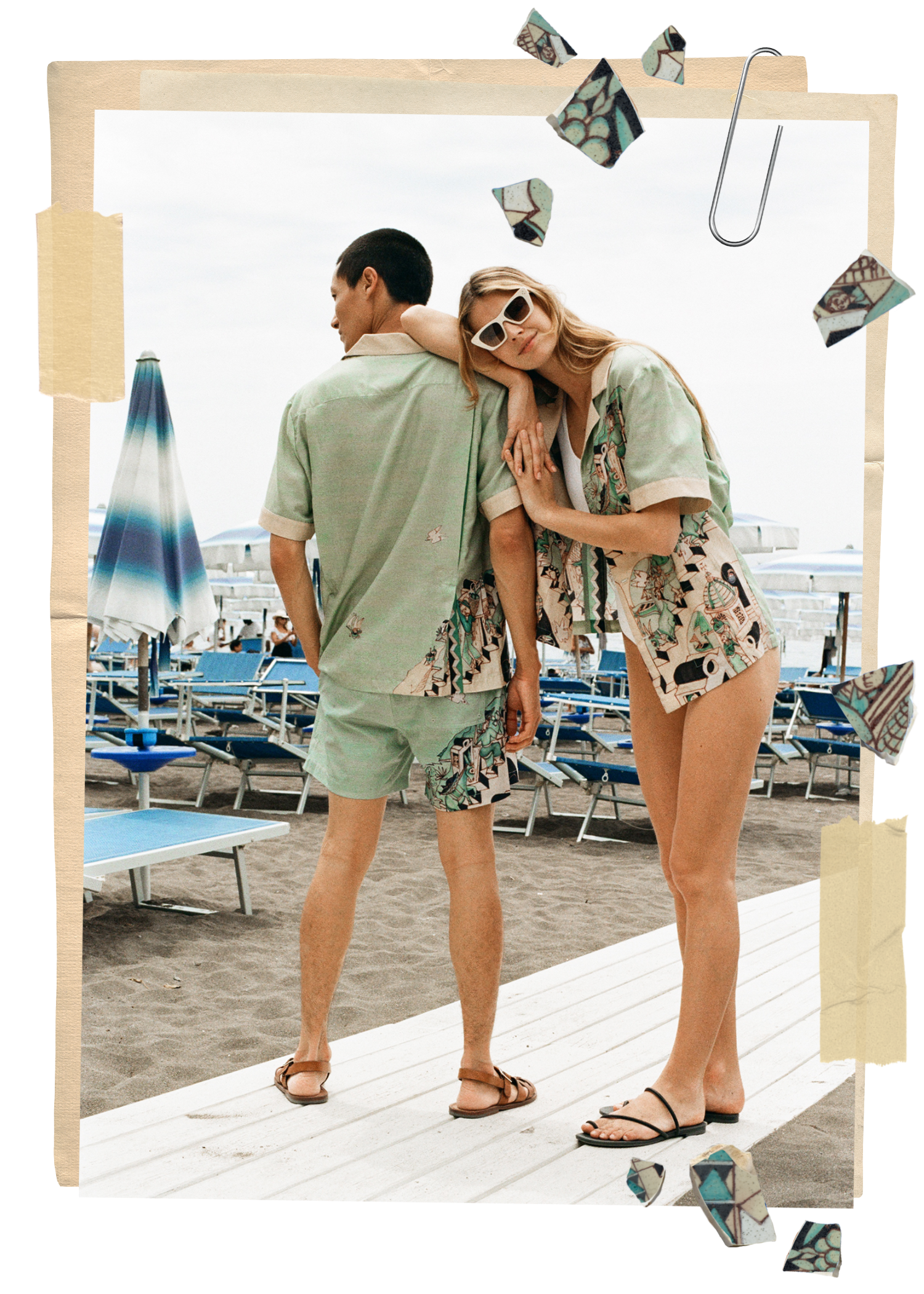 Woman leans on man facing away, both wearing matching set