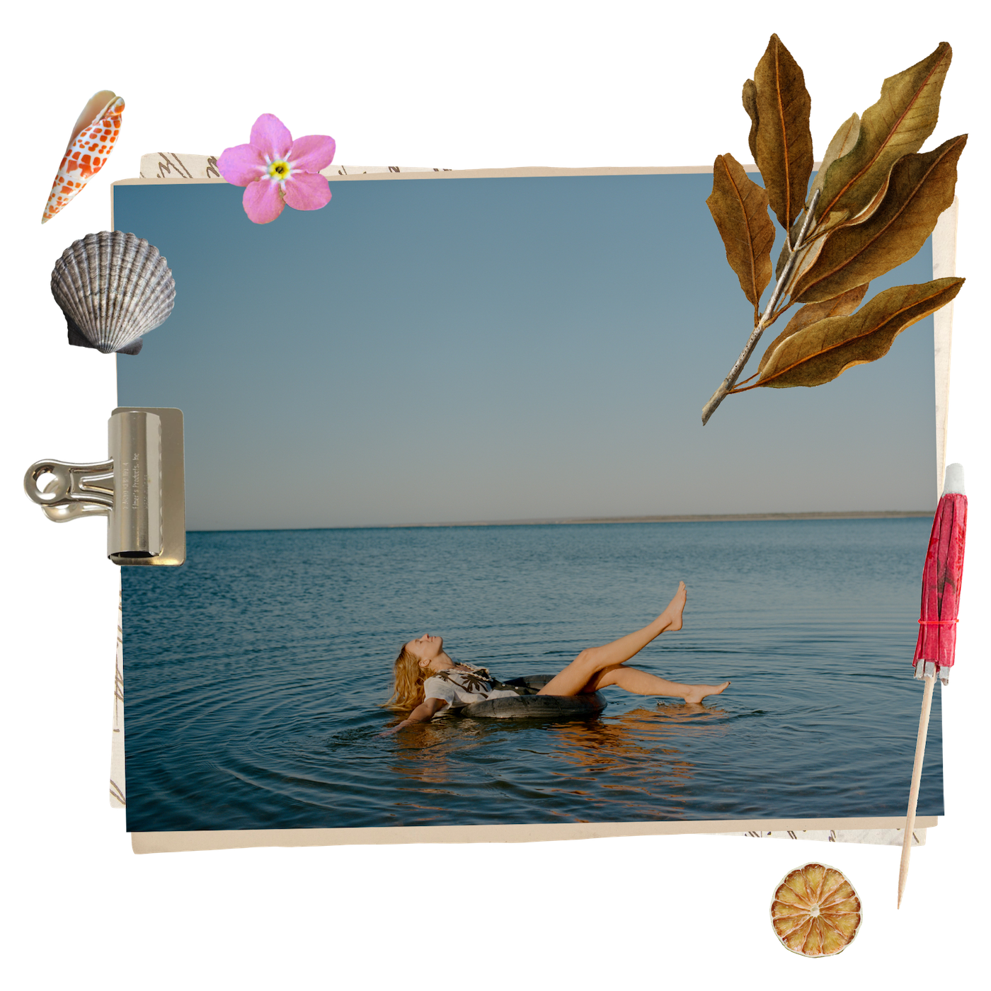Photo of woman lying on pool float in the middle of the ocean