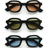 Three variations of the Lesca Lunetier X Tombolo Lenses where all feature a black lens frame and different lens colors (Charcoal, Azure, and Coral) with front-facing product imagery where the glasses appear above one another on a white background.