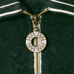 Close up detail of Green Terry Cloth Cabana Shirt's zipper. 