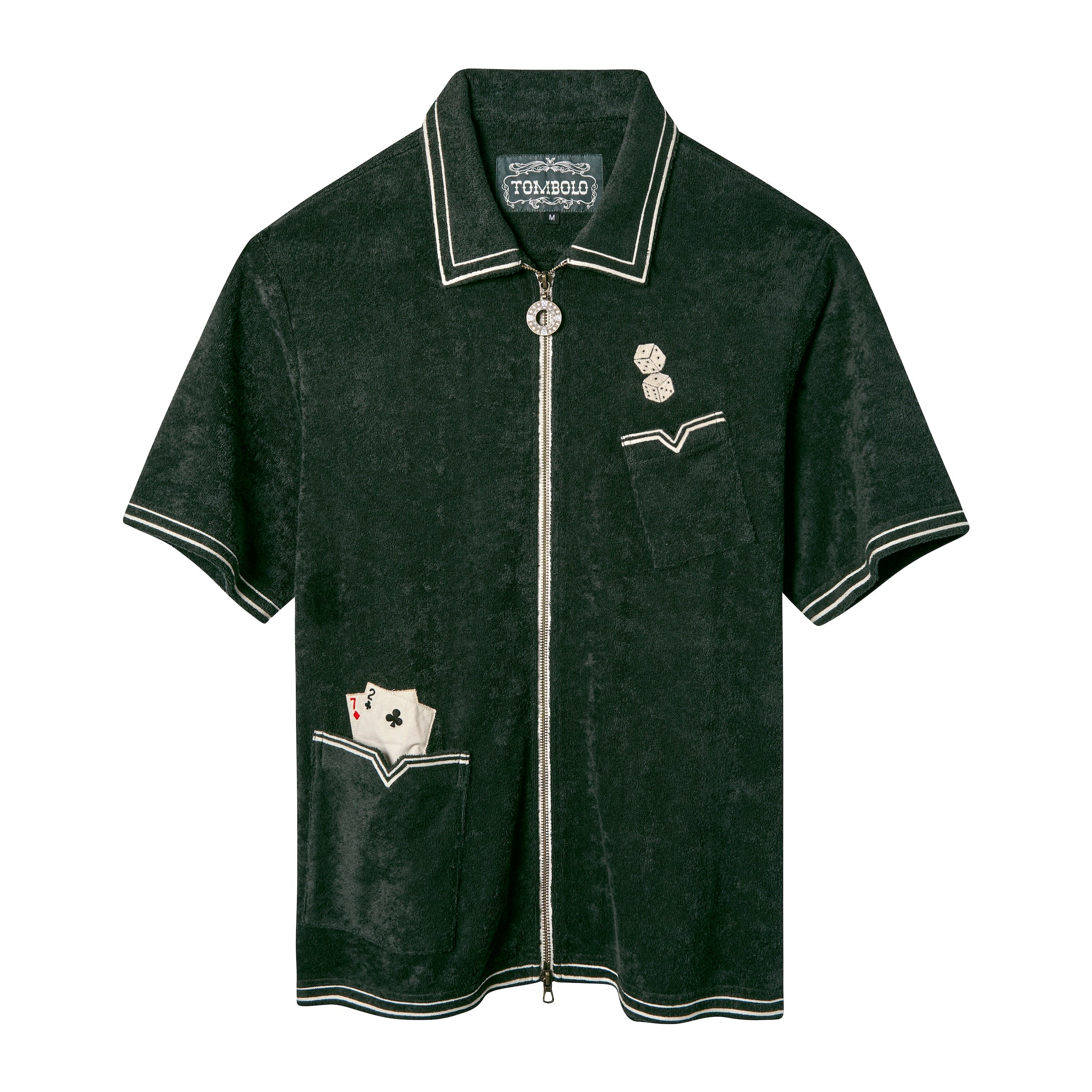 Dark green short-sleeve terry cloth shirt with white piping, a full front zipper, and embroidered gambling-themed details. Features include a pair of dice above the chest pocket and two playing cards—7 of hearts and 2 of clubs—peeking out of the lower left pocket.