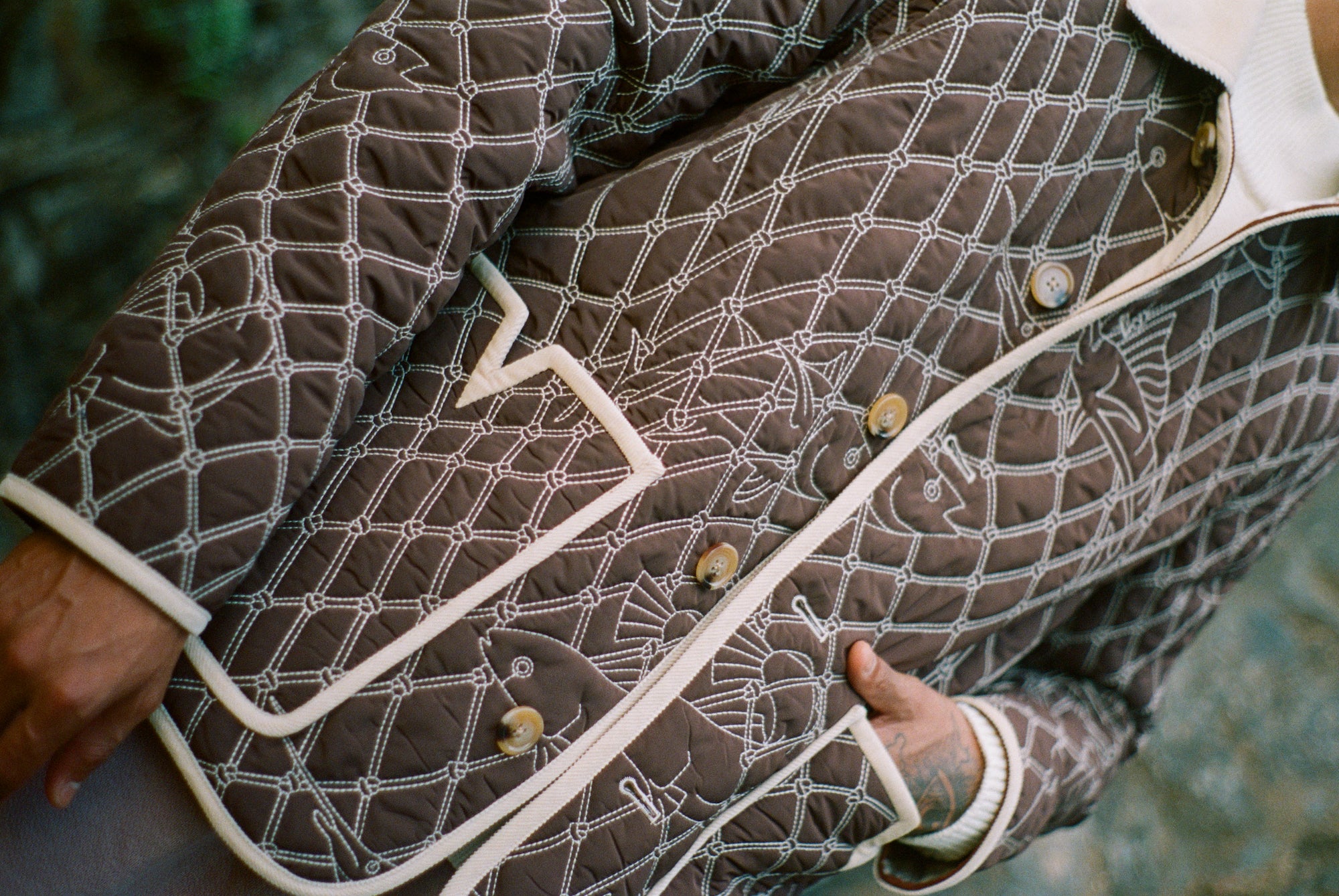 close up of jacket with one hand in pocket
