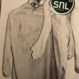 Vintage-style shirt with embroidered text and TOMBOLO for SNL logo.
