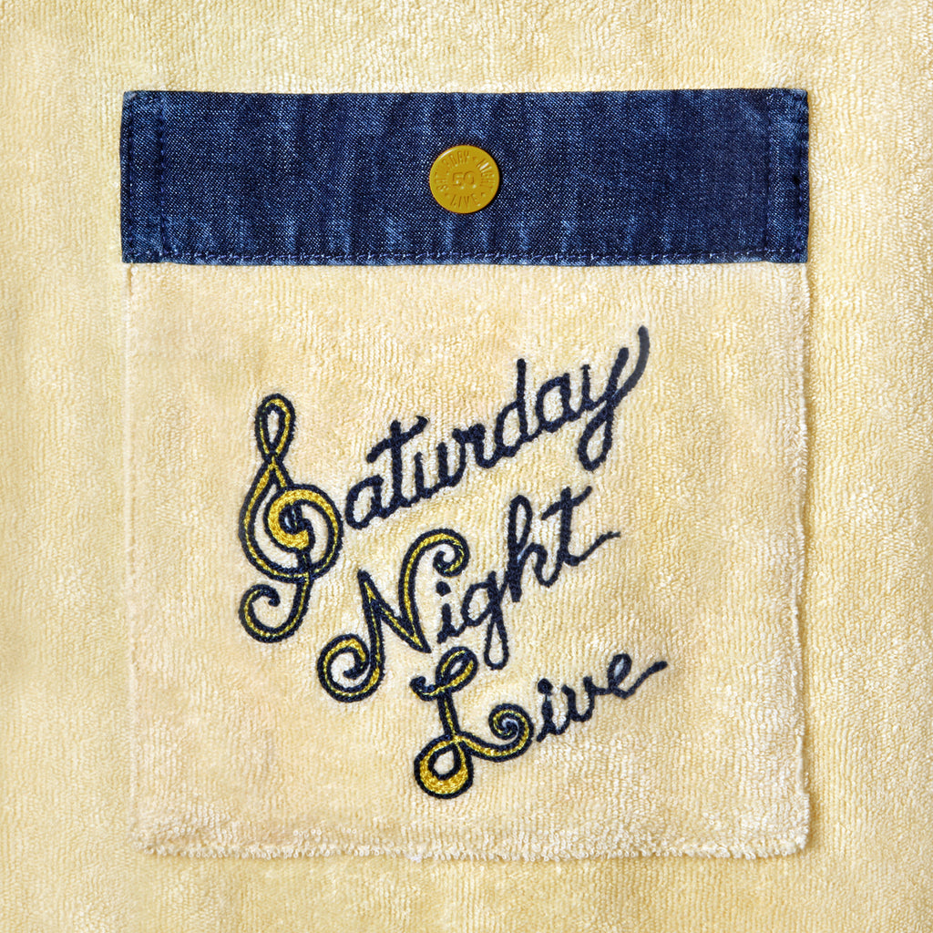 Close-up of chain-stitched "Saturday Night Live" logo on chest pocket - adapted from a freehand version of the logo from 1976, developed in partnership with costume designer Tom Broecker.
