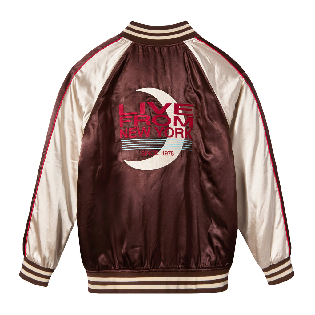 Maroon and cream satin souvenir jacket with striped cuffs and collar. The back features a large embroidered design with a crescent moon and text reading 'Live From New York' and 'Since 1975' in red and teal.