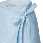 Light blue skirt detail shot of side bow on a white background.
