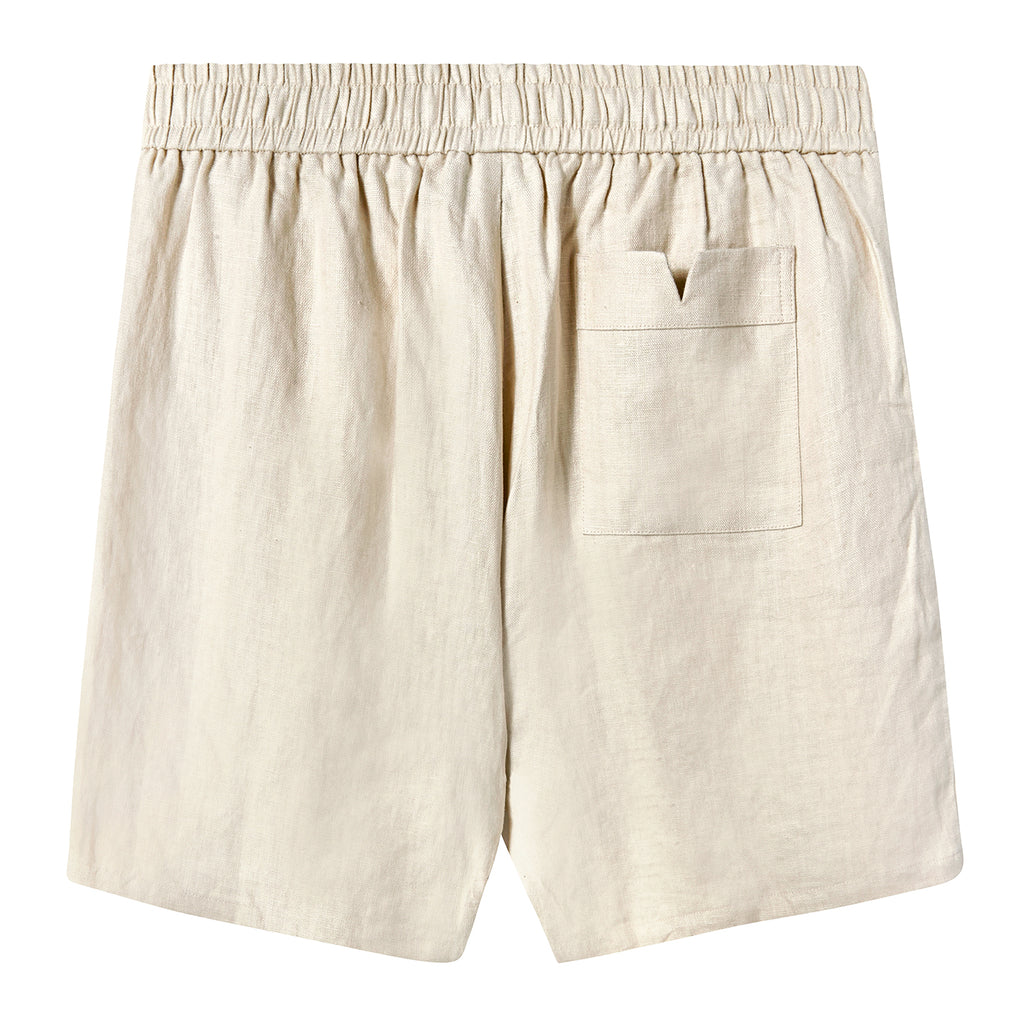 Backside of sand linen shorts with elastic waistband, and back pocket with v-notch on the right side. 